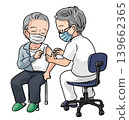Senior man wearing a mask while receiving vaccination 139662365