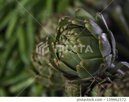 fresh artichokes at the market fresh artichokes at the market 139662572