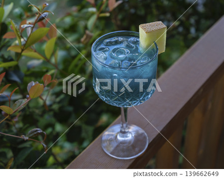 a delicious and cold blue alcoholic cocktail a delicious and cold blue alcoholic cocktail 139662649