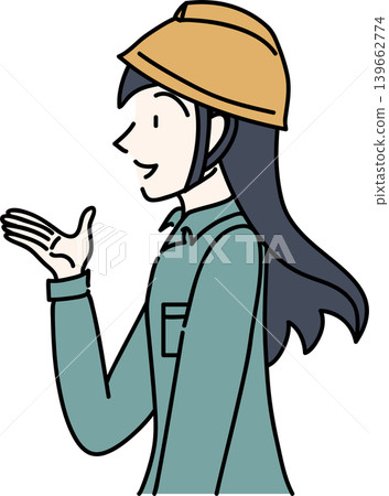 戴著安全帽、穿著工作服的女工的側面圖。 戴著安全帽、穿著工作服的女工的側面圖。 139662774