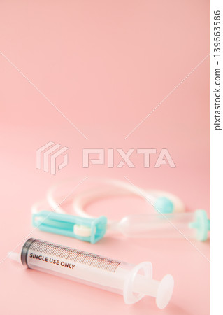 Syringe and IV tube Syringe and IV tube 139663586