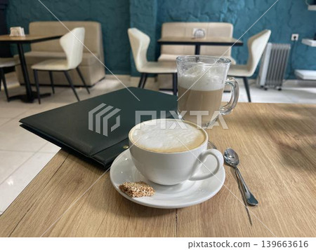 cup of coffee on the table in restaurant 139663616