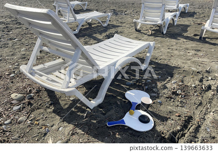 sun loungers for relaxing on the beach on a sunny day sun loungers for relaxing on the beach on a sunny day 139663633