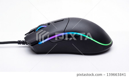 Close-up of a black gaming computer mouse with RGB led lighting on a white background high tech scroll wheel computer peripheral technology lighting electronic equipment accessories Close-up of a black gaming computer mouse with RGB led lighting on a white background high tech scroll wheel computer peripheral technology lighting electronic equipment accessories 139663841