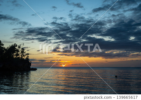 Sunset on Lia beach, Waleakodi Island, Togian archipelago, Sulawesi, Indonesia Sunset on Lia beach, Waleakodi Island, Togian archipelago, Sulawesi, Indonesia 139665617