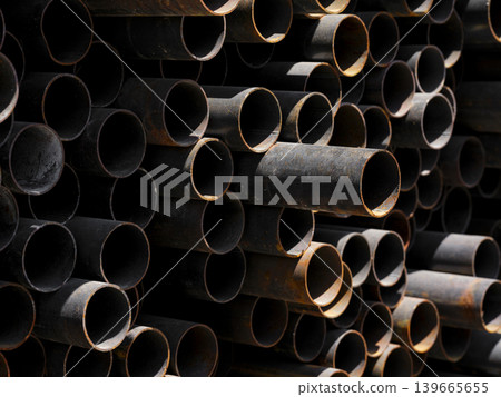 old rusty pipes in the junkyard old rusty pipes in the junkyard 139665655