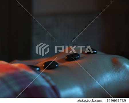 man getting massage at spa man getting massage at spa 139665789