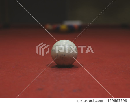 billiard balls on red pool table billiard balls on red pool table 139665798