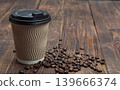 cup of coffee on wooden table 139666374