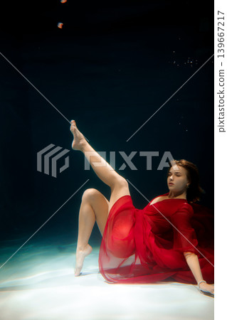 Glamorous underwater scene with glowing skin and refined makeup Glamorous underwater scene with glowing skin and refined makeup 139667217