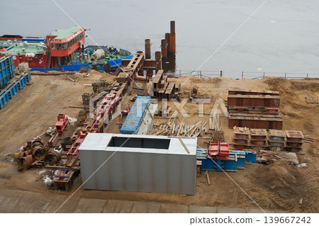 Steel storage site. Industrial steel area with organized materials Steel storage site. Industrial steel area with organized materials 139667242