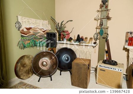 Cozy area designed for communal musical activities and relaxation Cozy area designed for communal musical activities and relaxation 139667428