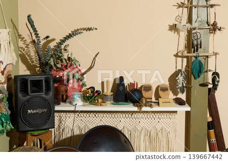 Musical performance area showcasing speakers and instruments Musical performance area showcasing speakers and instruments 139667442