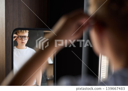Focusing on speech delivery while adjusting hair and glasses Focusing on speech delivery while adjusting hair and glasses 139667483