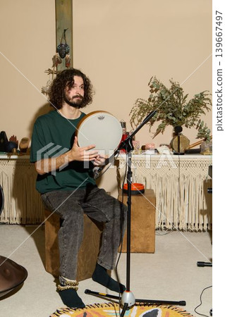 Concentrated artist creating rhythms in classic setting Concentrated artist creating rhythms in classic setting 139667497