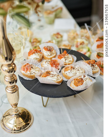 Sophisticated canape tower showcased with decorative accents and textures Sophisticated canape tower showcased with decorative accents and textures 139667658