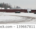 Vehicle control practice on snowcovered training circuit 139667811