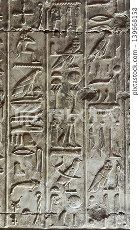 Beautiful bas-reliefs and ancient hieroglyphs in the Temple of Seti I in Abydos, Egypt. Beautiful bas-reliefs and ancient hieroglyphs in the Temple of Seti I in Abydos, Egypt. 139668158