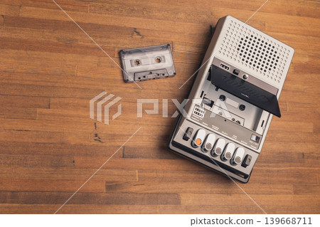Vintage cassette recorder and tape on wooden surface Vintage cassette recorder and tape on wooden surface 139668711
