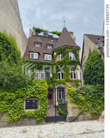 Ivy Covered Historic House Turret Green Facade Ivy Covered Historic House Turret Green Facade 139668739