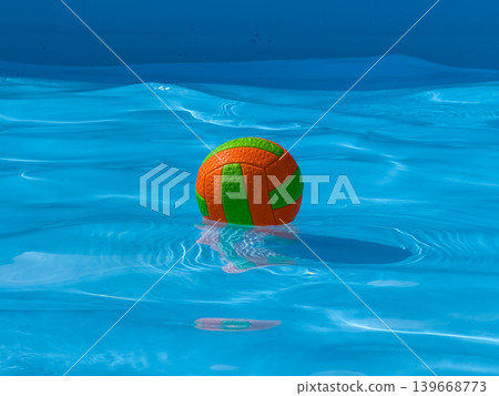 Bright Colored Ball Floating Blue Pool Water Waves Bright Colored Ball Floating Blue Pool Water Waves 139668773
