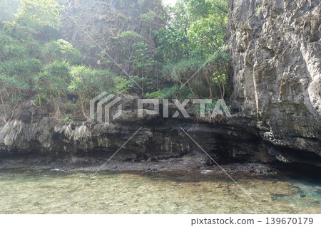 Rock in the ocean, stone structure Rock in the ocean, stone structure 139670179