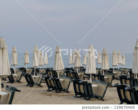 Empty Beach Lounge Chairs Minimalist Seascape View Empty Beach Lounge Chairs Minimalist Seascape View 139670409
