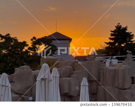 Dramatic Sunset Orange Sky Resort Poolside View Dramatic Sunset Orange Sky Resort Poolside View 139670410