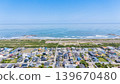 Drone aerial photography of a coastal residential area and the Pacific Ocean in Ichinomiya Town, Chiba Prefecture. 139670480
