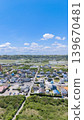 Drone aerial photography of a coastal residential area and the Pacific Ocean in Ichinomiya Town, Chiba Prefecture. 139670481