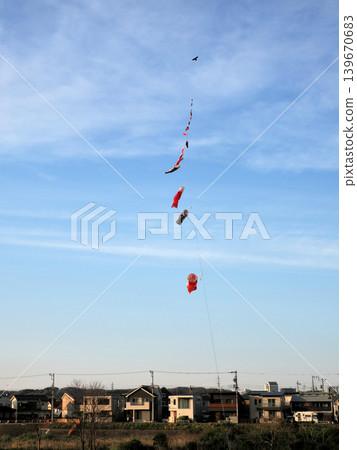 A kite soaring in the sky A kite soaring in the sky 139670683