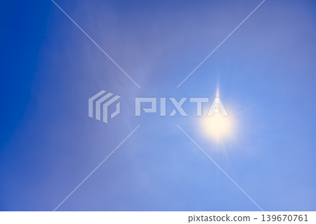 Background image of a blue sky with iridescent clouds and a shining sun - Yokohama 139670761