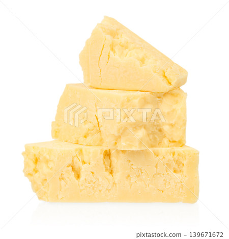 Parmesan cheese pieces isolated on white background Parmesan cheese pieces isolated on white background 139671672