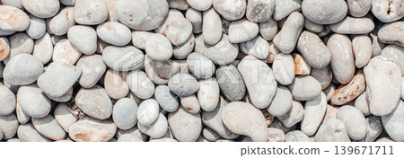 White pebbles texture background with natural smooth stone pattern 139671711