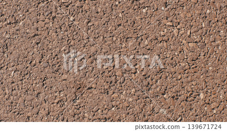 Brown asphalt texture background with rough road surface pattern Brown asphalt texture background with rough road surface pattern 139671724