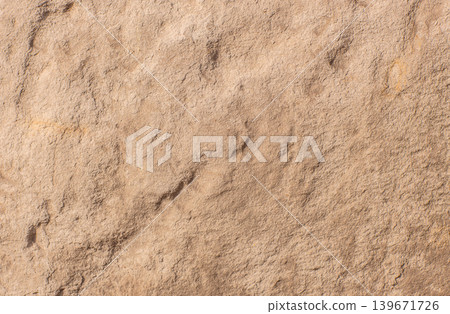 Beige stone wall texture background with rough natural surface 139671726