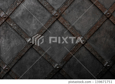 Dark industrial metal texture with rusty riveted grid pattern background Dark industrial metal texture with rusty riveted grid pattern background 139671751