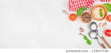 Cooking ingredients with spices and herbs on white background with copy space Cooking ingredients with spices and herbs on white background with copy space 139672546