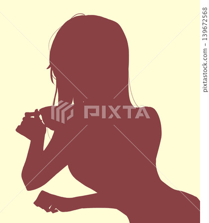 A woman with an air of ennui, a teacup, silhouette. A woman with an air of ennui, a teacup, silhouette. 139672568