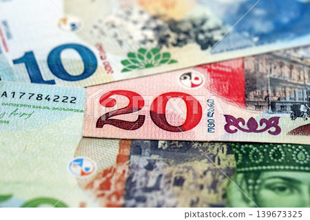 Georgian Lari currency money bills. GEL currency banknotes in pile 139673325