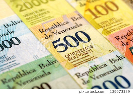 Venezuelan Bolivar currency money bills in pile. VED currency banknotes Venezuelan Bolivar currency money bills in pile. VED currency banknotes 139673329