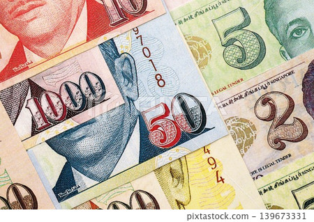Singapore Dollar currency money bills. SGD currency banknotes in big amount Singapore Dollar currency money bills. SGD currency banknotes in big amount 139673331