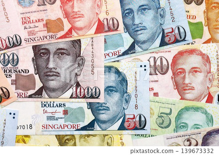 Singapore Dollar currency money bills. SGD currency banknotes in stack Singapore Dollar currency money bills. SGD currency banknotes in stack 139673332