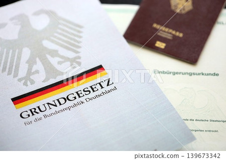 The constitution basic law book of Germany and passport with citizenship certificate 139673342