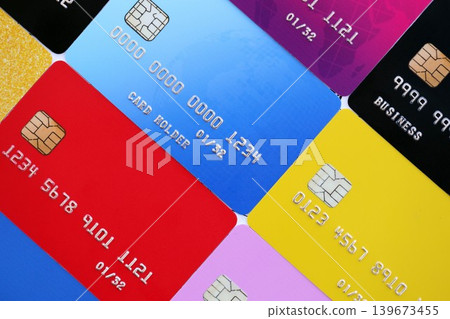 Many credit or debit cards with fictional specimen numbers. Big amount of banking plastic cards Many credit or debit cards with fictional specimen numbers. Big amount of banking plastic cards 139673455