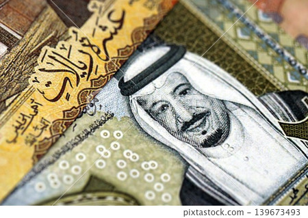 Saudi Arabia riyal money bills banknotes lies in big pile on table. Business in Saudi Arabia Saudi Arabia riyal money bills banknotes lies in big pile on table. Business in Saudi Arabia 139673493