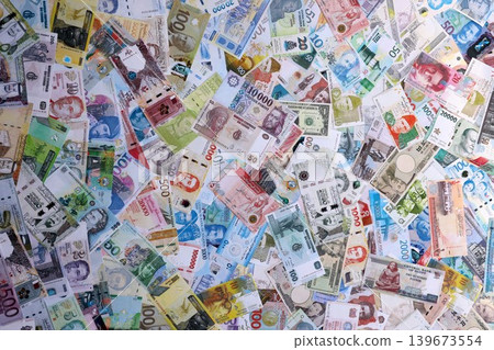 Many banknotes from different countries of the world of different denominations Many banknotes from different countries of the world of different denominations 139673554