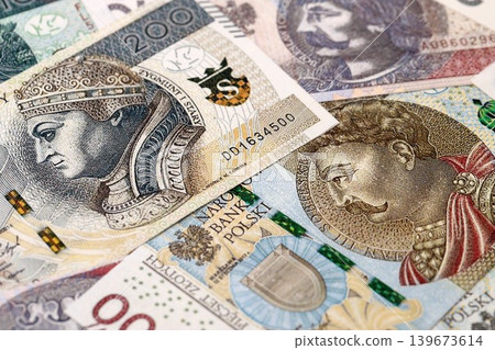 Big amount of polish zloty money bills banknotes close up. Huge pile of cash of Poland currency Big amount of polish zloty money bills banknotes close up. Huge pile of cash of Poland currency 139673614