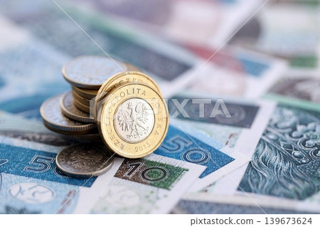 Coins and banknotes of Polish zloty and grosz currency. Poland PLN money close up. Business Coins and banknotes of Polish zloty and grosz currency. Poland PLN money close up. Business 139673624