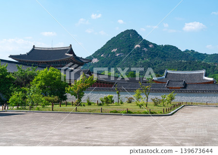 Seoul, South Korea - May. 14, 2026 : Scenic landscape of Gyeongbokgung Palace with the rocky peaks of Inwangsan Mountain in early summer, Seoul, South Korea Seoul, South Korea - May. 14, 2026 : Scenic landscape of Gyeongbokgung Palace with the rocky peaks of Inwangsan Mountain in early summer, Seoul, South Korea 139673644